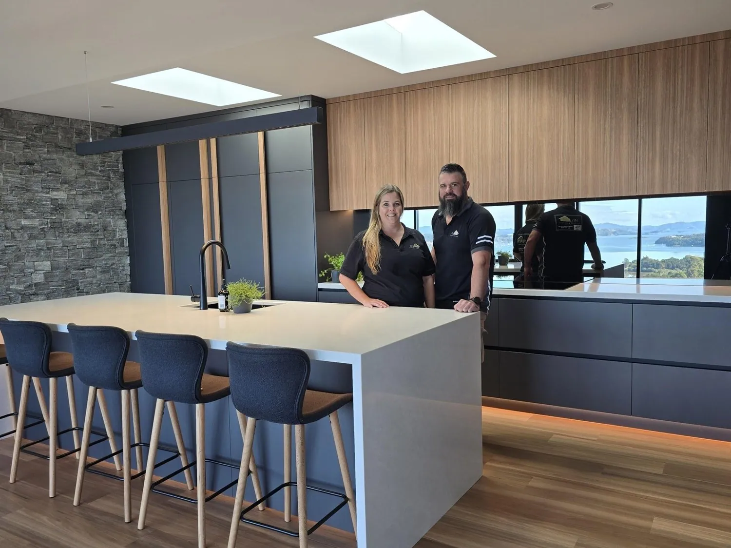 Caryn and Stephan of Strydeco in a finished custom kitchen